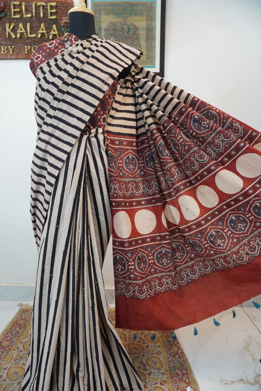 Cream Ajrakh cotton saree with red and black stripes and a border