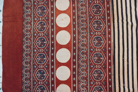 Cream Ajrakh cotton saree with red and black stripes and a border