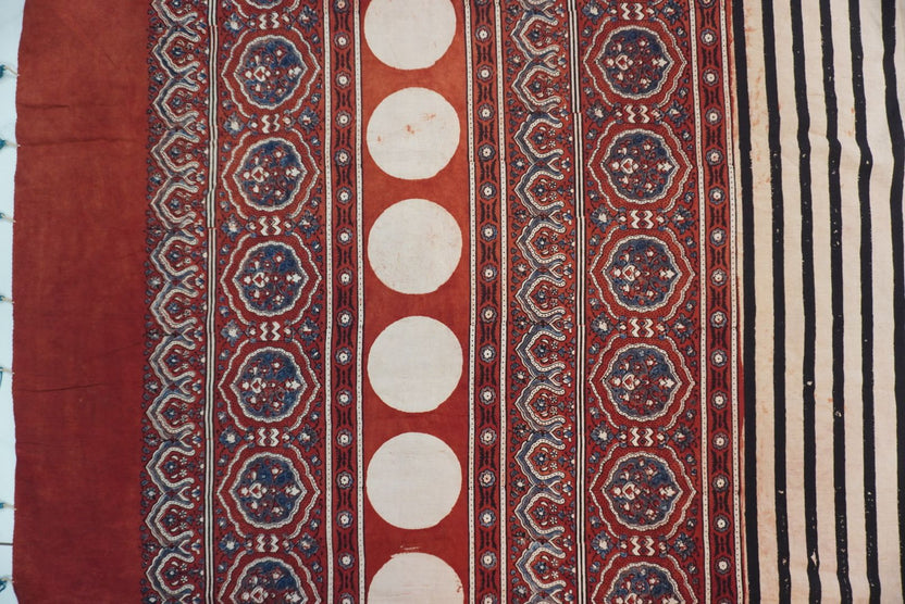 Cream Ajrakh cotton saree with red and black stripes and a border