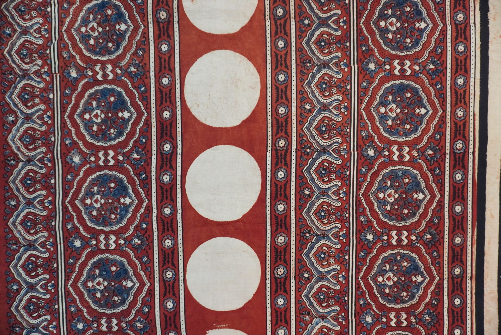 Cream Ajrakh cotton saree with red and black stripes and a border