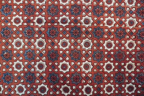 Red Ajrakh cotton saree with geometric circle design in white, blue and black