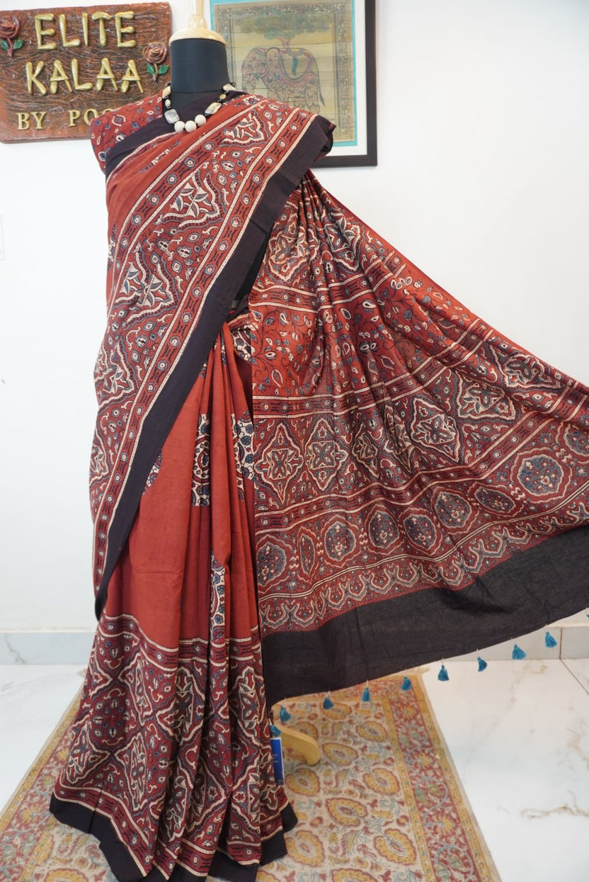 Red Ajrakh cotton saree with geometric circle design in white, blue and black