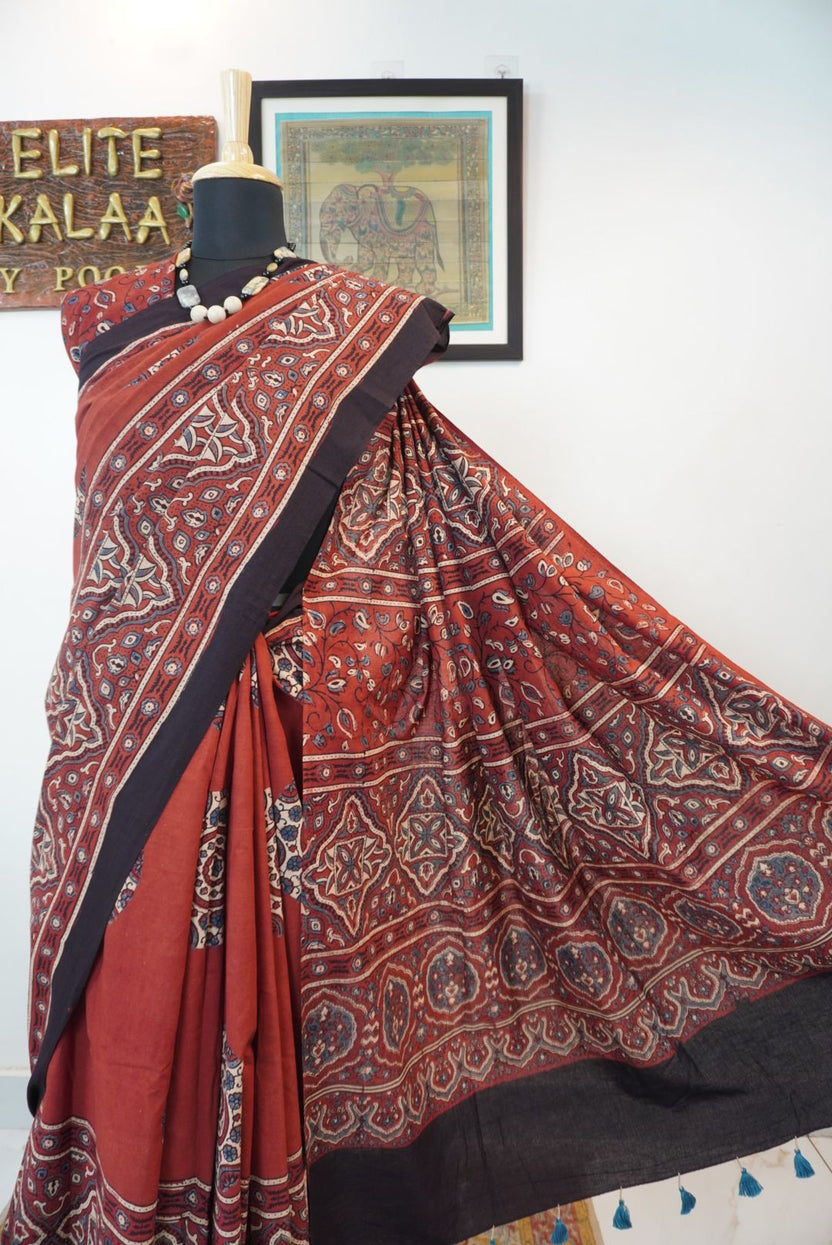 Red Ajrakh cotton saree with geometric circle design in white, blue and black