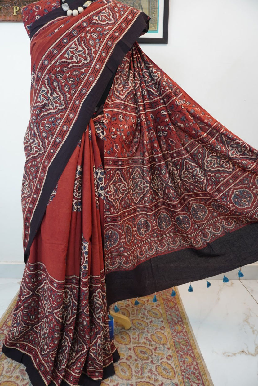 Red Ajrakh cotton saree with geometric circle design in white, blue and black