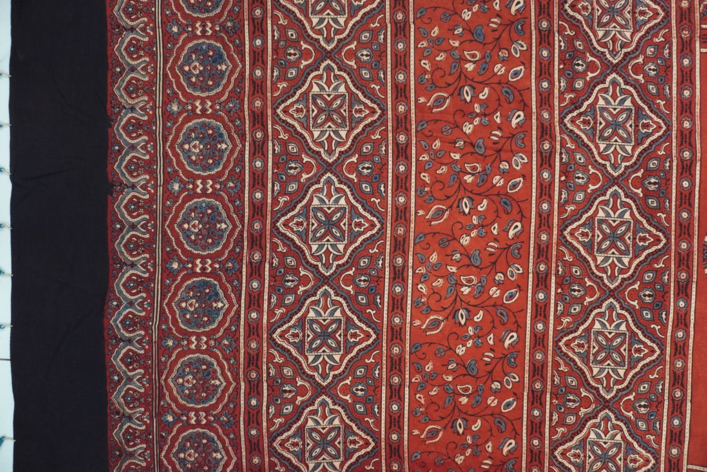 Red Ajrakh cotton saree with geometric circle design in white, blue and black