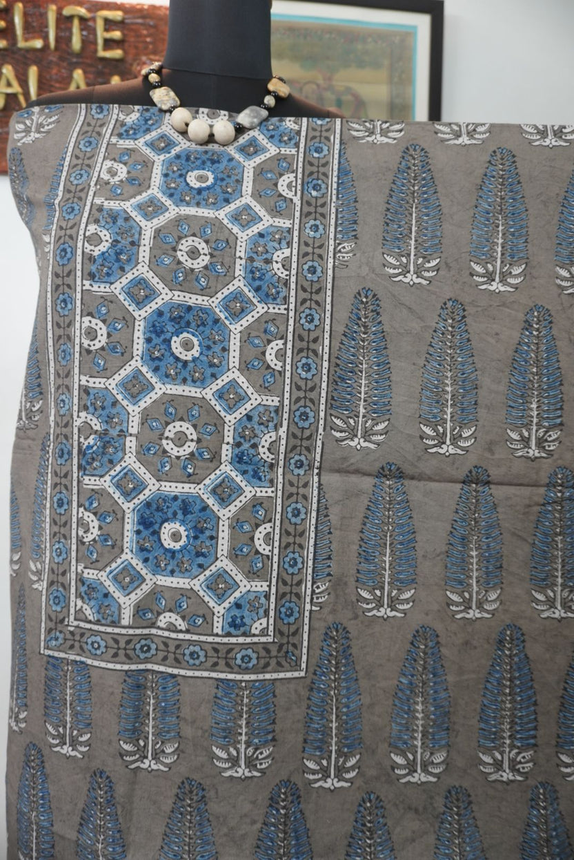 Brown Ajrakh handblock cotton 3 piece unstitched suit set with blue, beige, white and grey accents and border detail
