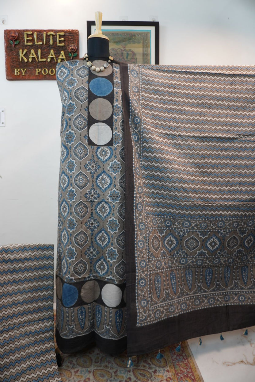 Brown cotton Ajrakh 3 piece suit set with all-over multicolor pattern, border and tassels