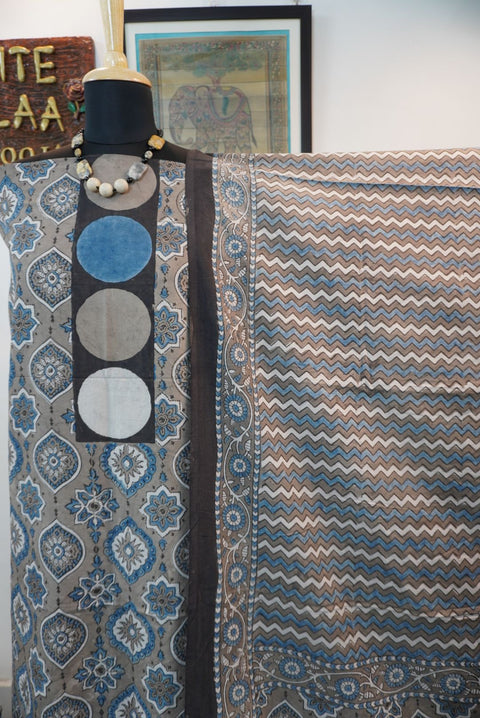 Brown cotton Ajrakh 3 piece suit set with all-over multicolor pattern, border and tassels
