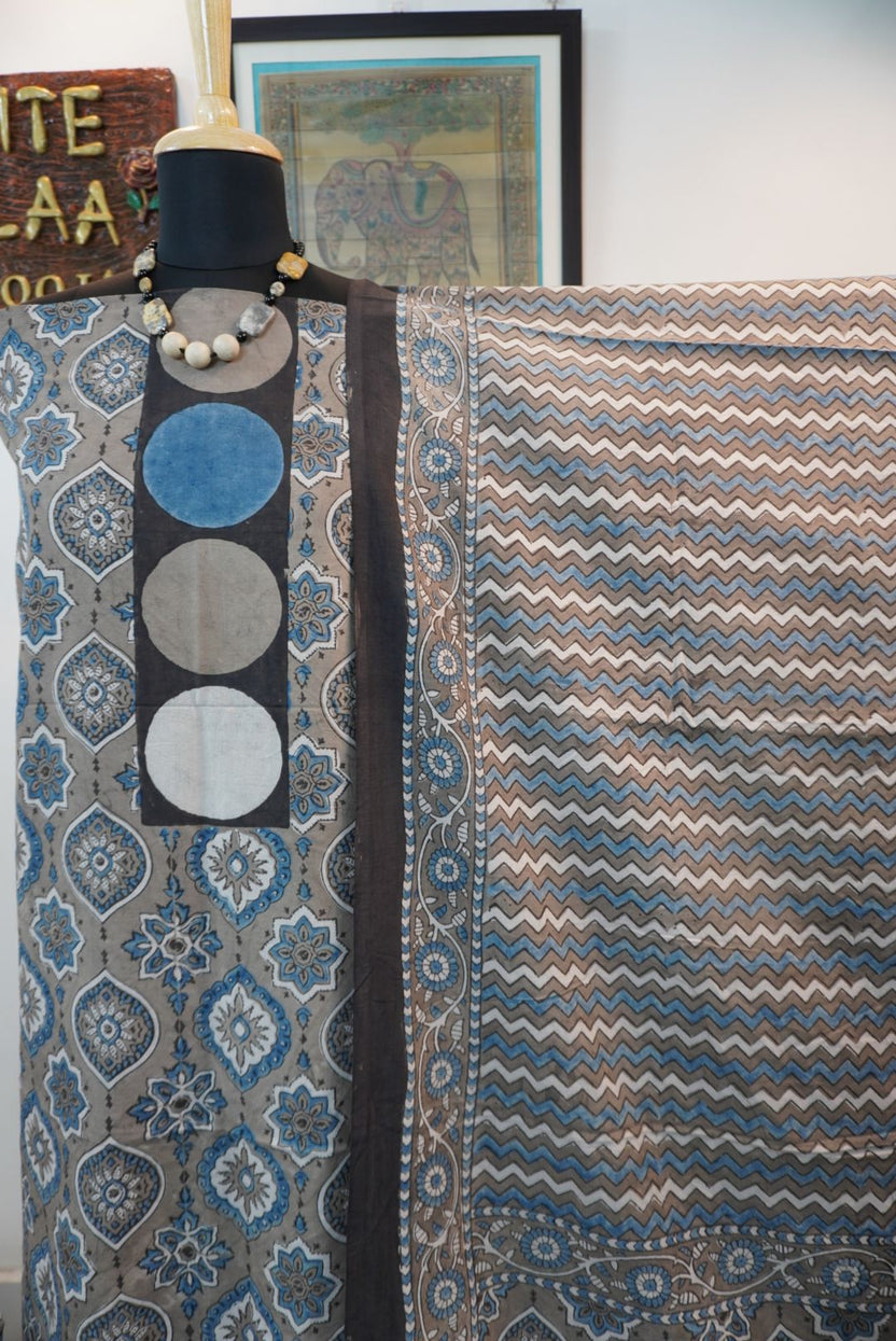 Brown cotton Ajrakh 3 piece suit set with all-over multicolor pattern, border and tassels