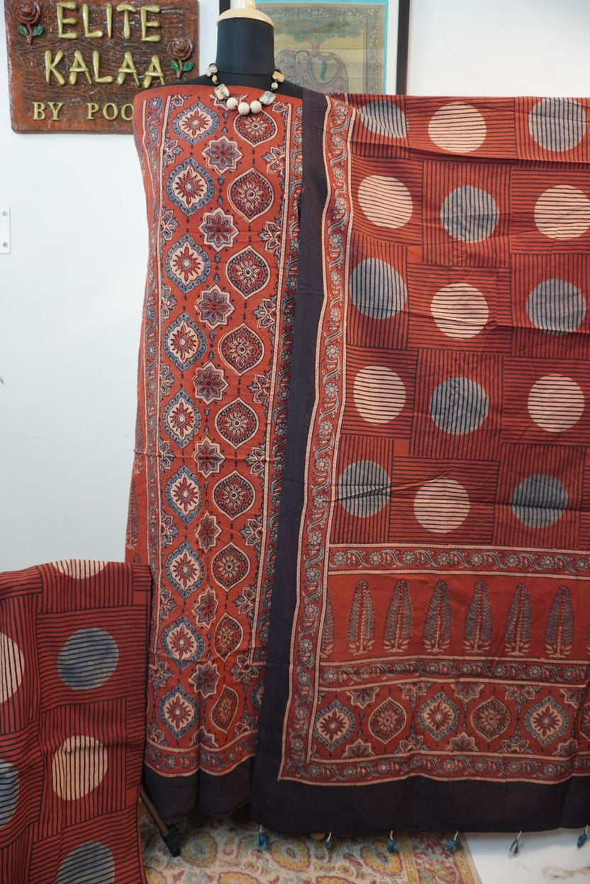 Cotton Ajrakh 3 piece dress material in red rust with placement pattern, border and tassels
