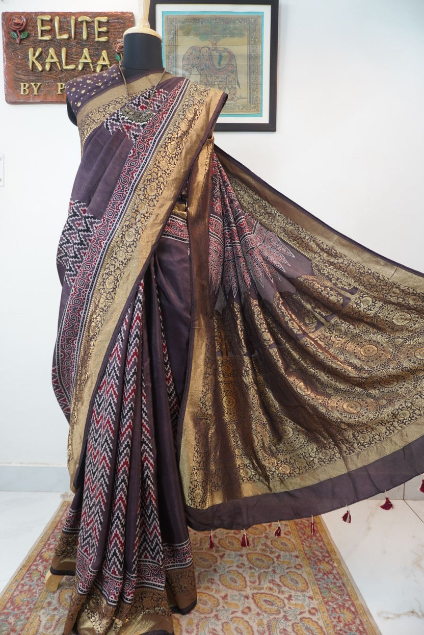 Brown Ajrakh silk saree with multicolor block print, border and tassels