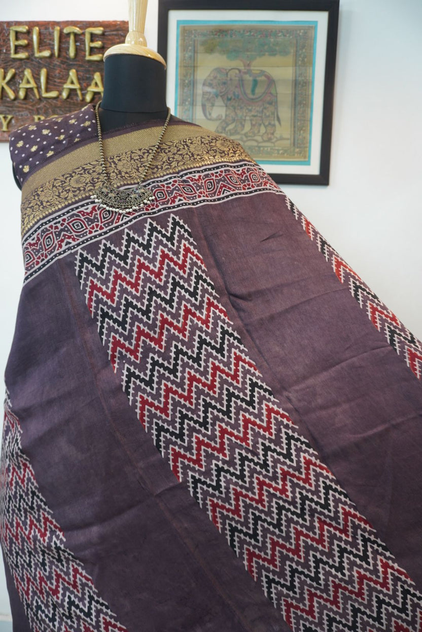 Brown Ajrakh silk saree with multicolor block print, border and tassels