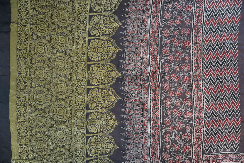 Brown Ajrakh silk saree with multicolor block print, border and tassels