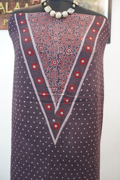 Brown Ajrakh-style block print kurta fabric with red and cream details and a border