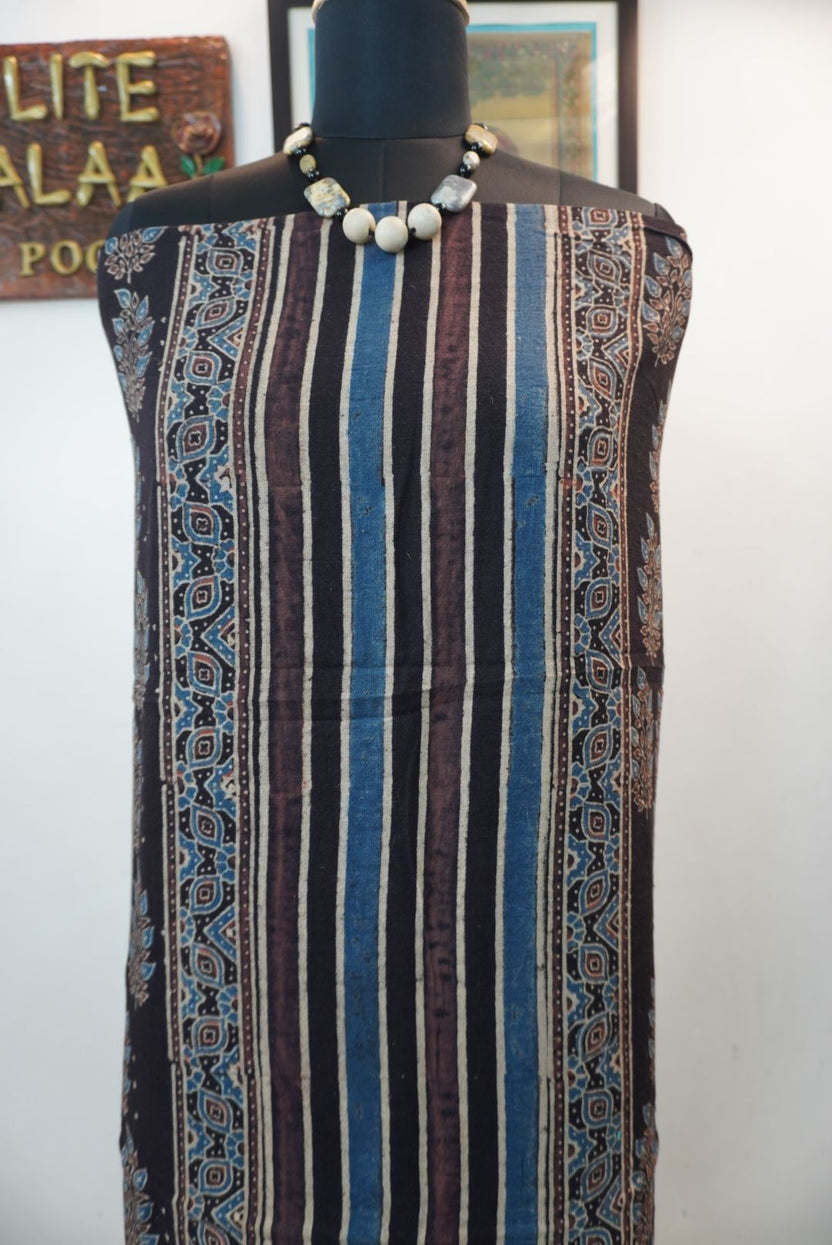Black kurta fabric with multicolor blue, cream and brown block print pattern and border detail