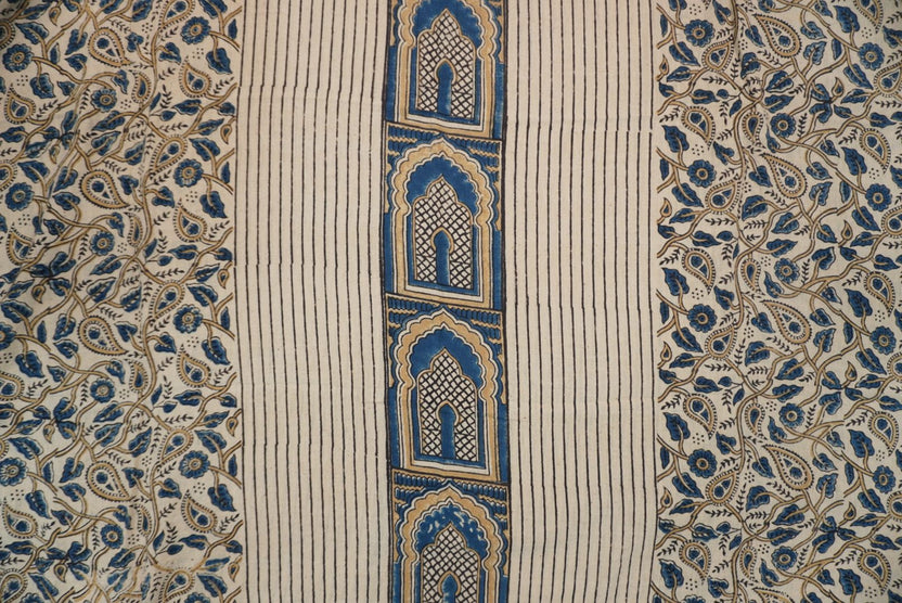 Ivory kurta fabric with blue, black and beige placement pattern