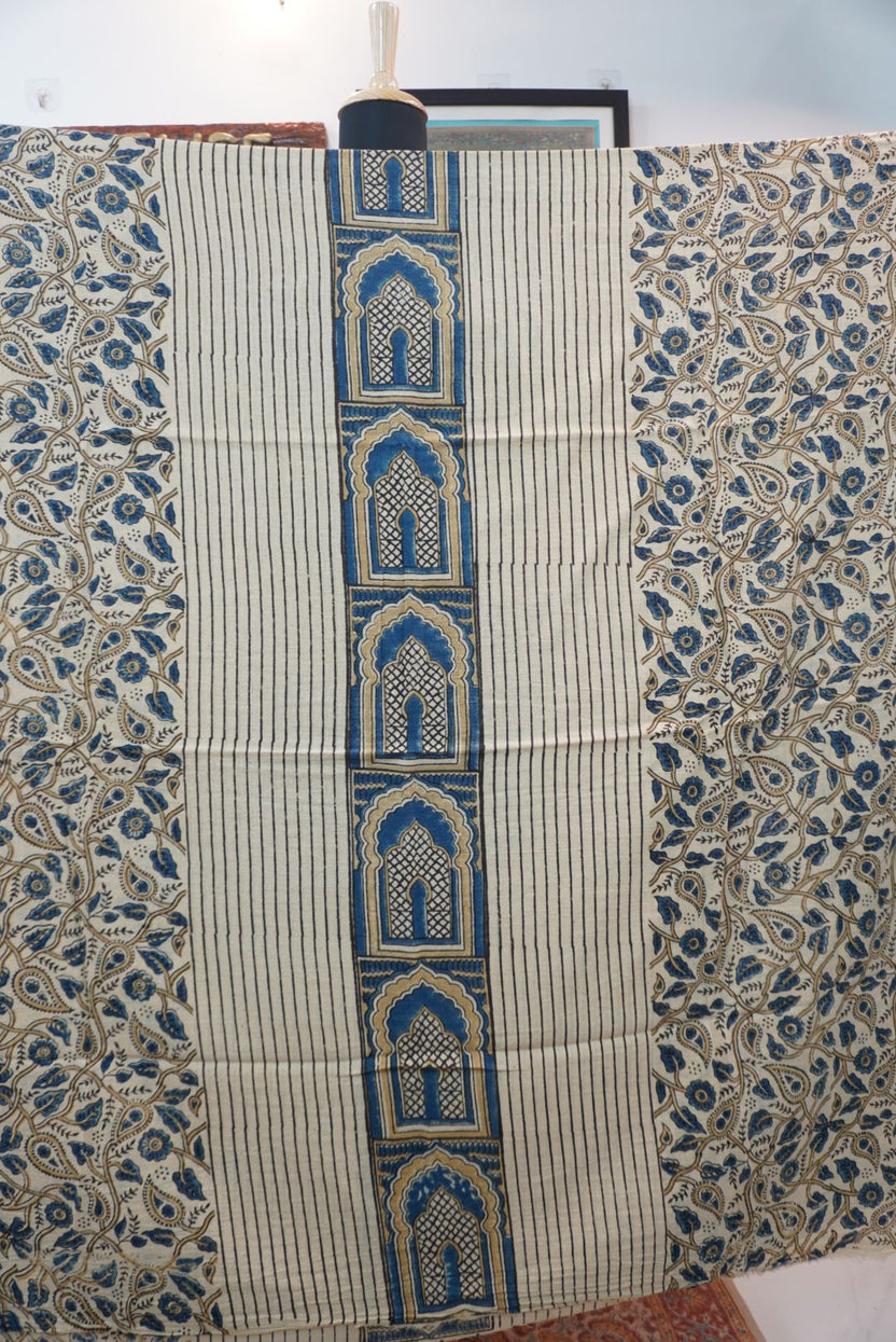 Ivory kurta fabric with blue, black and beige placement pattern