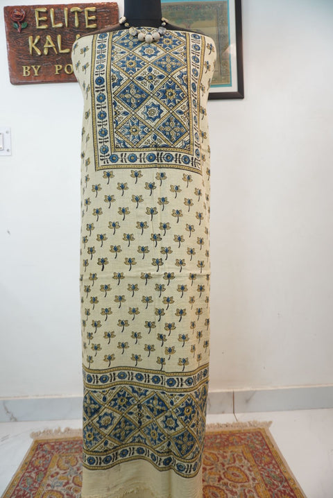 Cream kurta fabric with blue, beige and black block print pattern, border detail and fringe