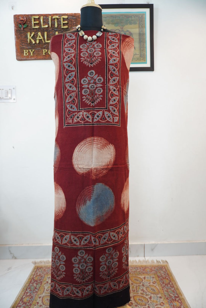 Red rust kurti fabric with multicolor block print pattern and visible border