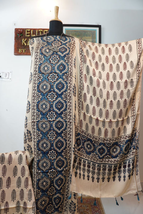 Cream and multicolor 3 piece suit set with ivory badam boota placement pattern, border and tassels