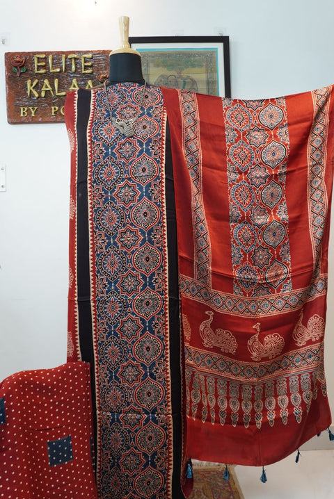 Red Ajrakh handblock 3 piece dress material with blue, cream and black peacock-inspired block print and border