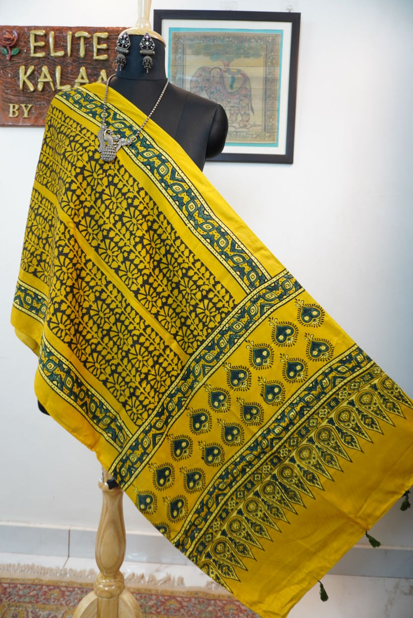 Yellow Ajrakh modal stole with black and teal leaf design placement pattern and border