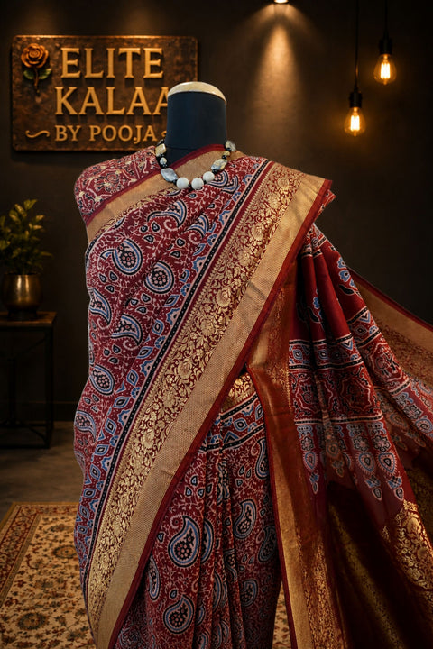 Dola Silk Ajrakh Saree Red with Floral Nakshi Pallu, Border, Zari & Tassels