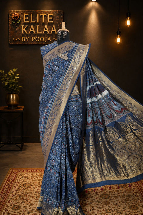 Dola Silk Ajrakh Saree Indigo Blue with Floral Nakshi Pallu, Border & Thread Tassels