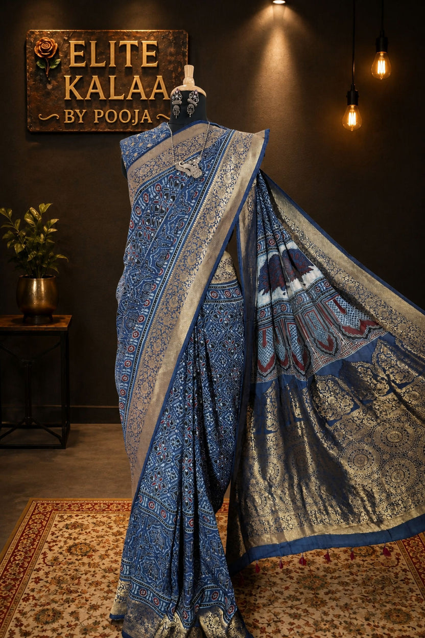 Dola Silk Ajrakh Saree Indigo Blue with Floral Nakshi Pallu, Border & Thread Tassels