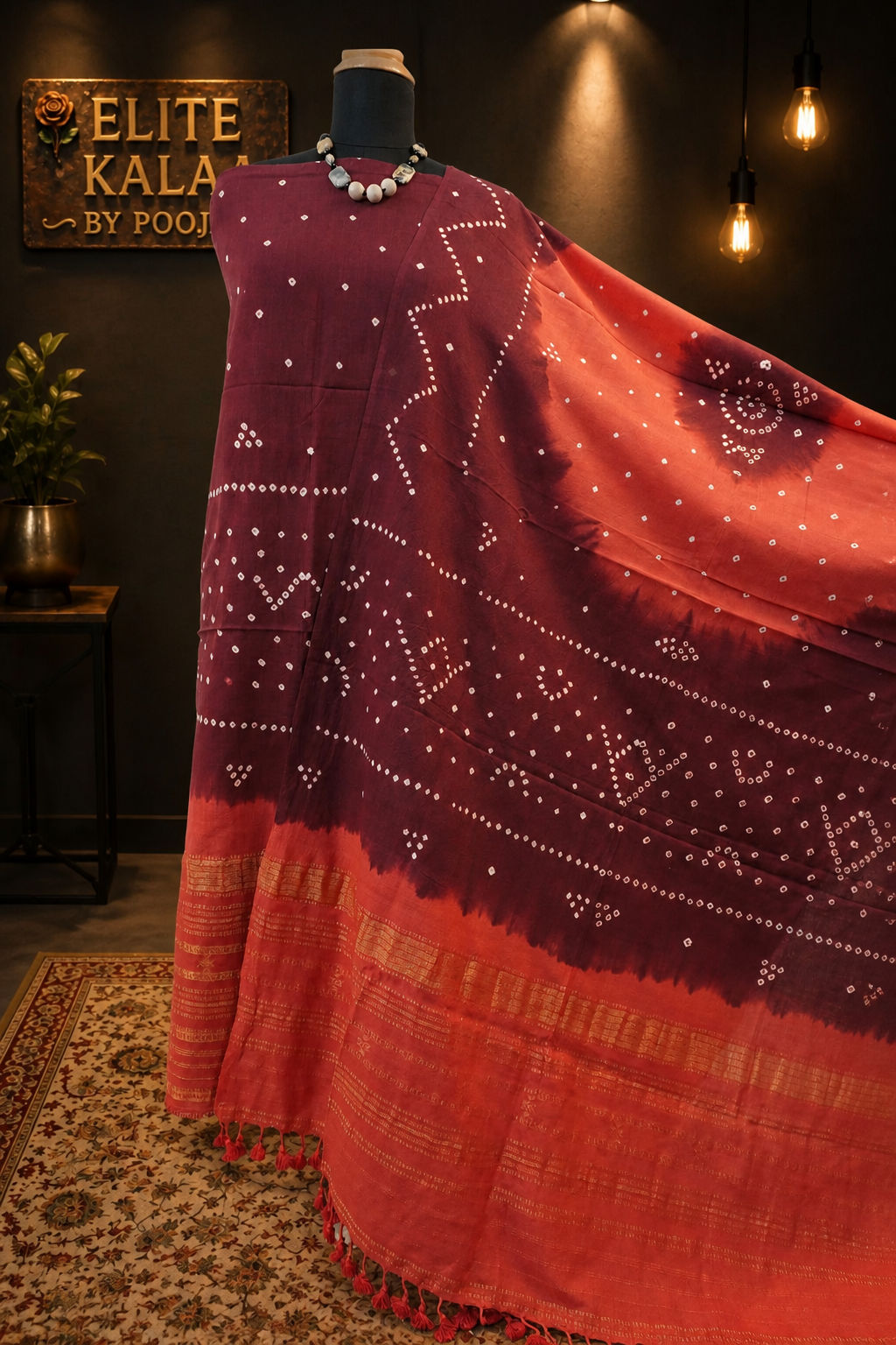 Ajrakh handblock bandhni 2 piece suit in carrot pink and maroon with border, tassels and zari detailing