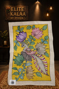 Yellow Kalamkari fabric piece with peacock and floral placement pattern and a border