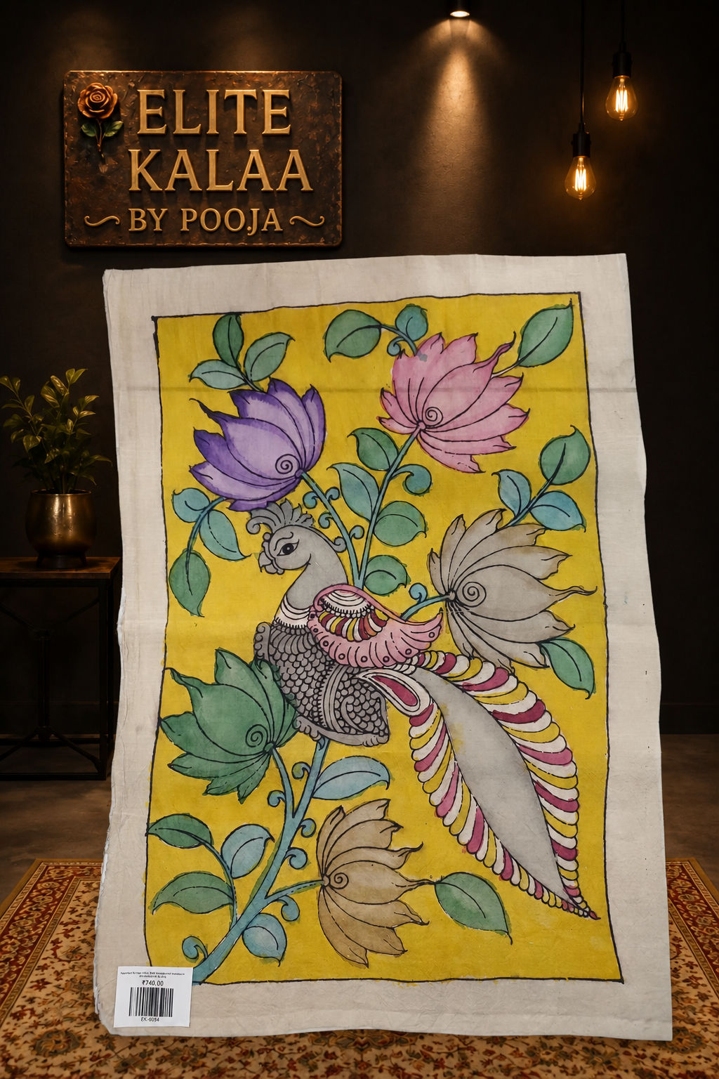 Yellow Kalamkari fabric piece with peacock and floral placement pattern and a border