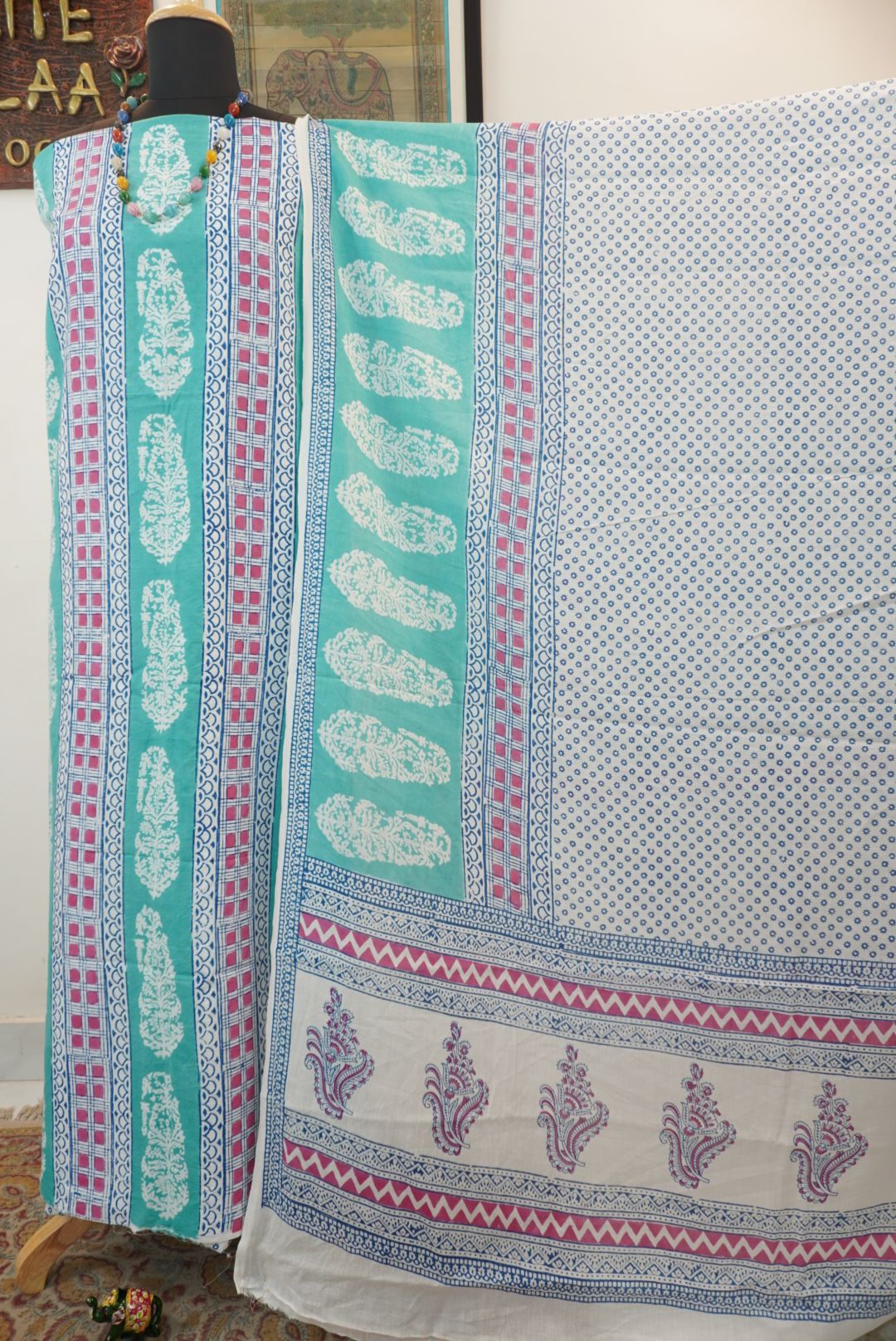 Green cotton Bagh block print 3 piece suit set with blue, pink and white accents and border