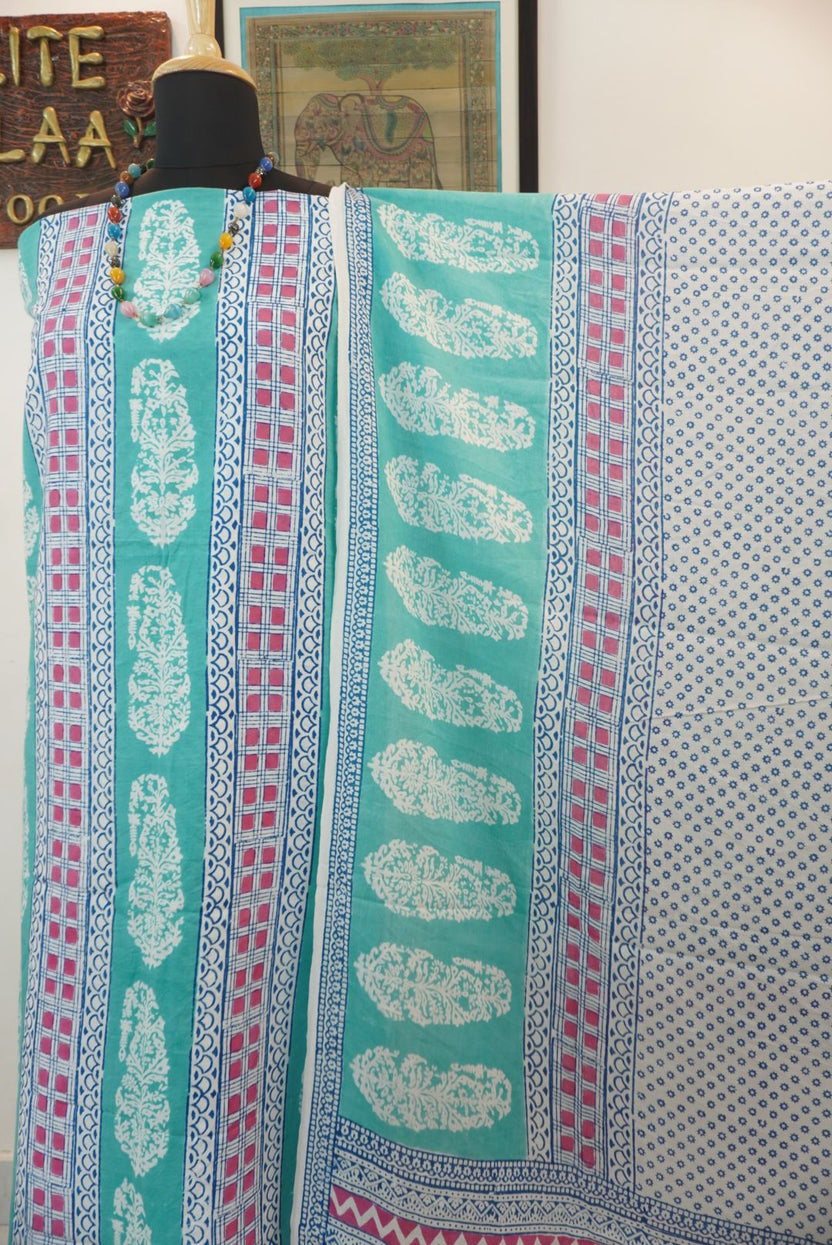 Green cotton Bagh block print 3 piece suit set with blue, pink and white accents and border