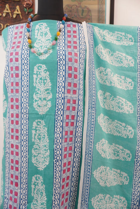 Green cotton Bagh block print 3 piece suit set with blue, pink and white accents and border