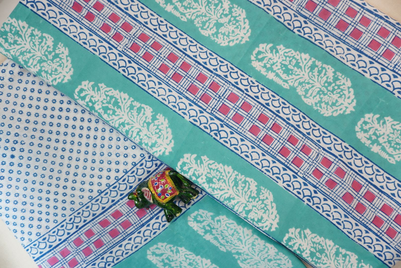 Green cotton Bagh block print 3 piece suit set with blue, pink and white accents and border