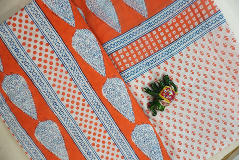 Orange cotton Bagh printed 3 piece suit set with white and blue placement pattern and border detail