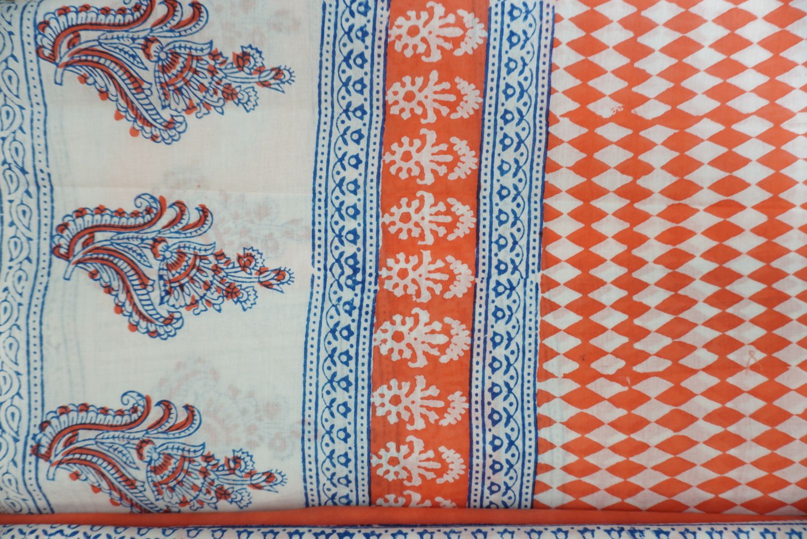 Orange cotton Bagh handblock 3 piece suit set with white and blue design and border