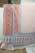 Orange cotton Bagh block print 3-piece suit set with blue and white accents and border detail