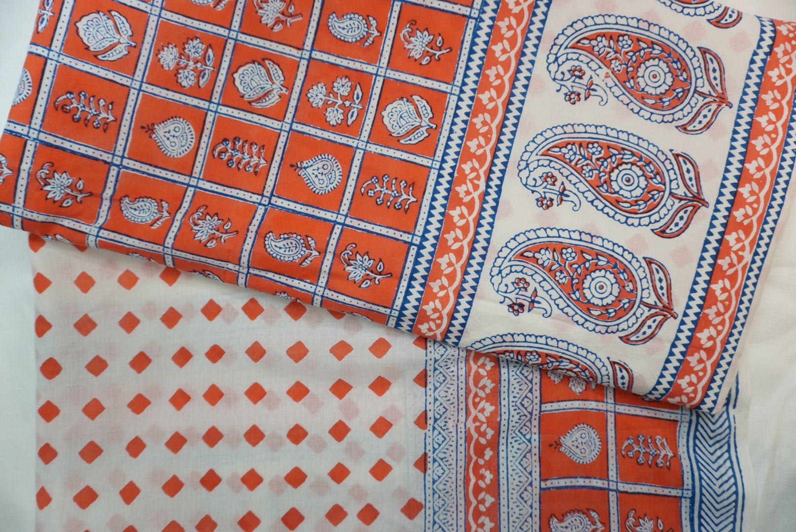 Orange cotton Bagh block print 3-piece suit set with blue and white accents and border detail