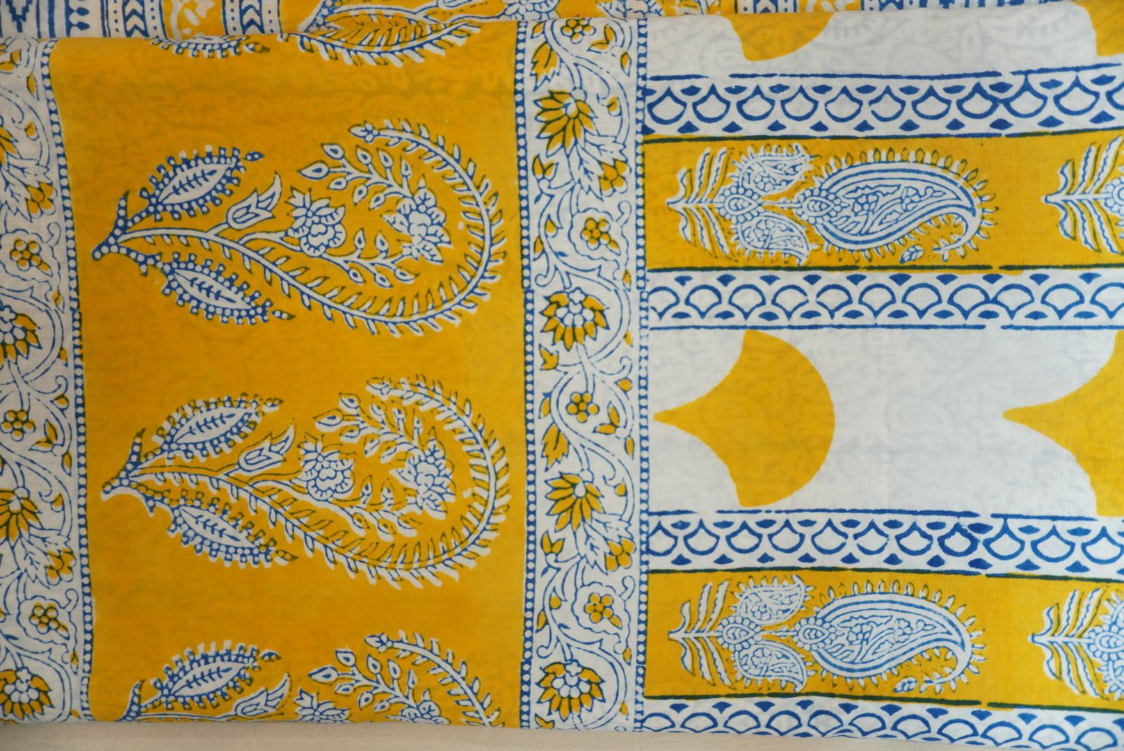 Yellow cotton Bagh handblock 3 piece unstitched suit set with blue and white accents and border