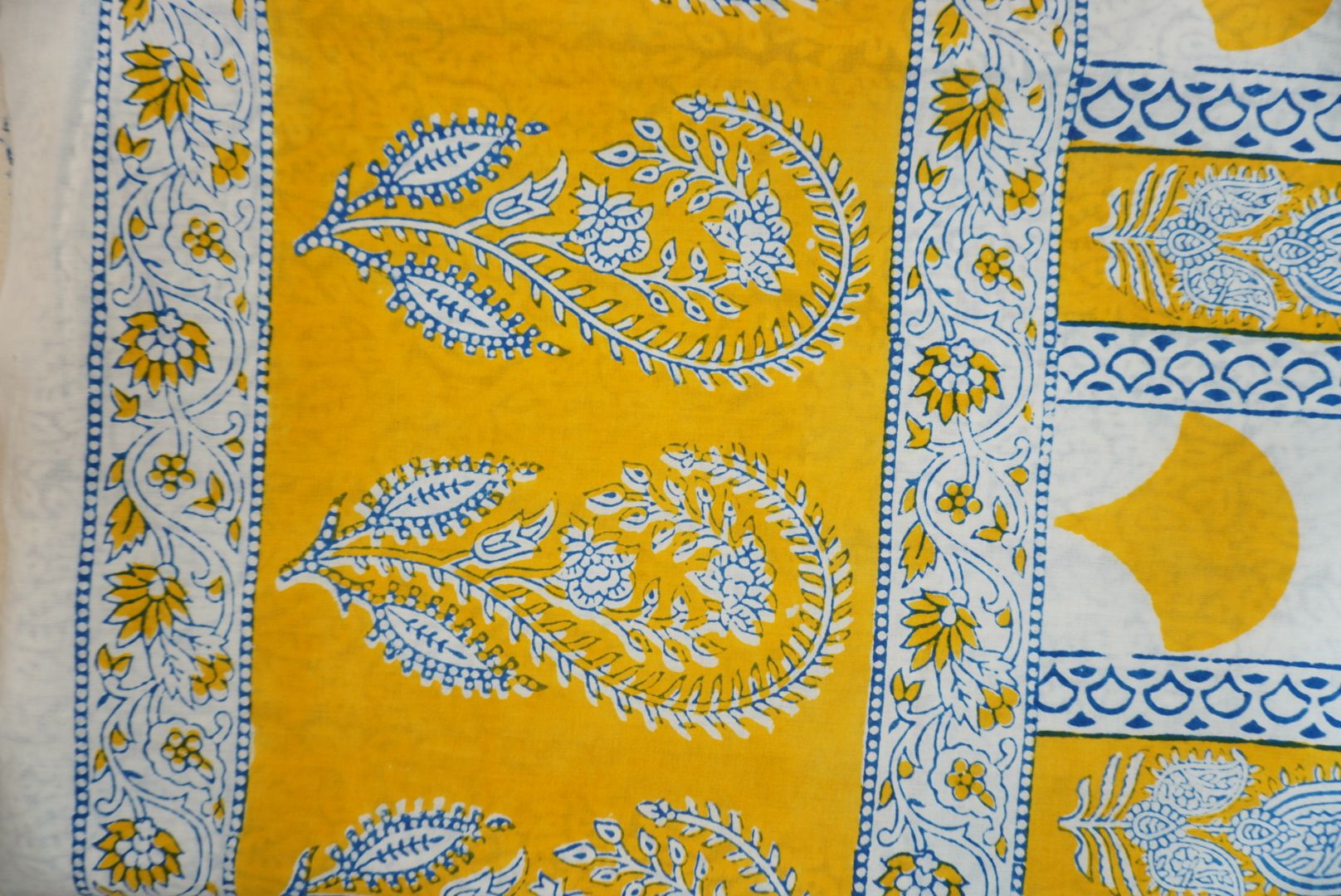 Yellow cotton Bagh handblock 3 piece unstitched suit set with blue and white accents and border