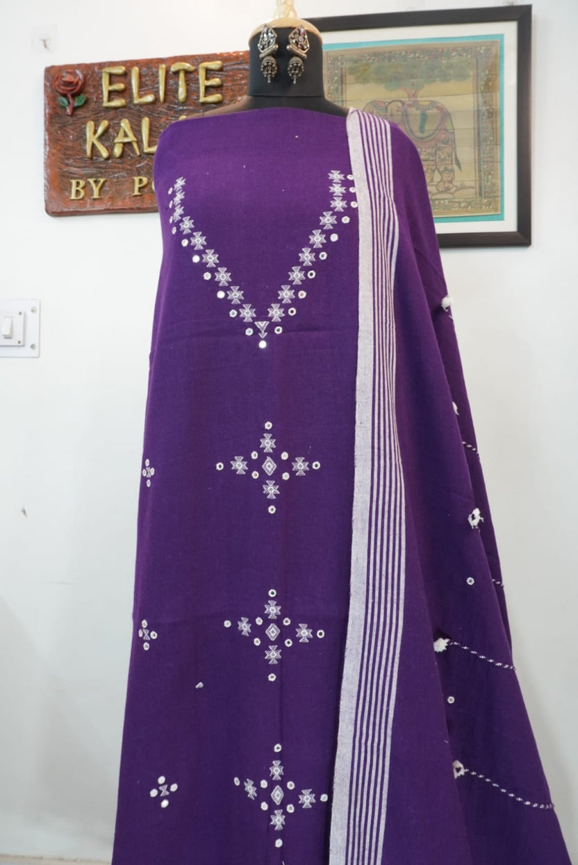 Purple dress material with border, tassels and fringe detail