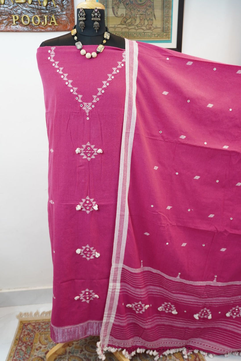 Magenta pink Bhujodi Kala cotton suit fabric with white detailing, border and tassels