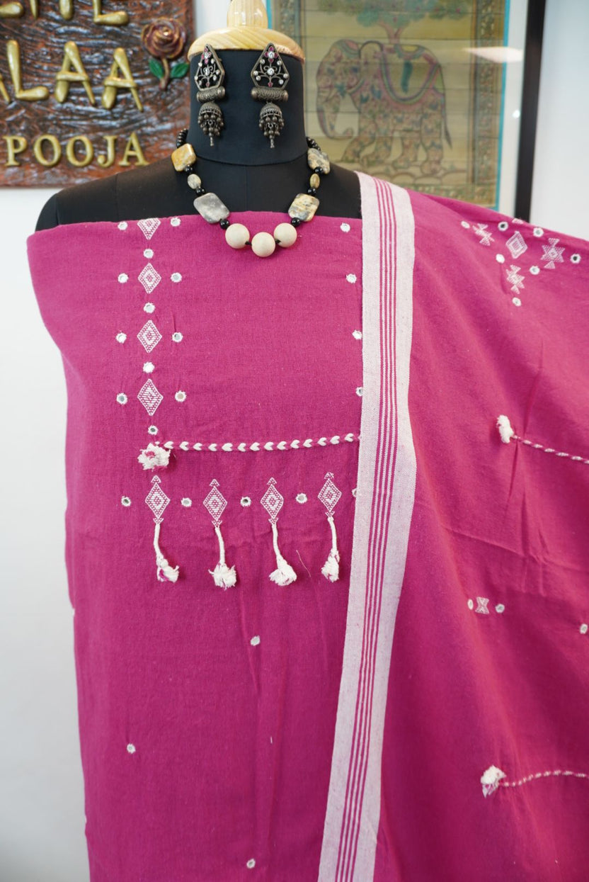 Bhujodi Kala Cotton suit fabric in magenta pink with white detailing, border and tassels