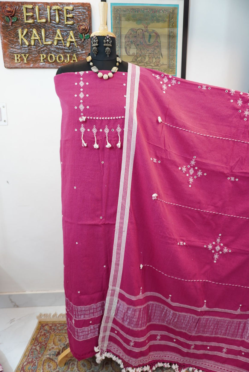Bhujodi Kala Cotton suit fabric in magenta pink with white detailing, border and tassels