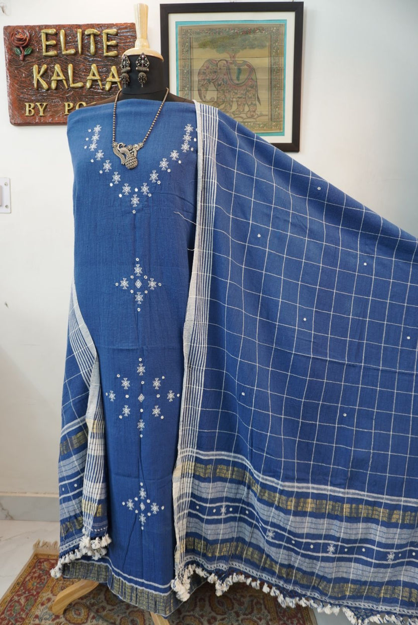 Blue 3 piece dress material with checked pattern, border and tassels