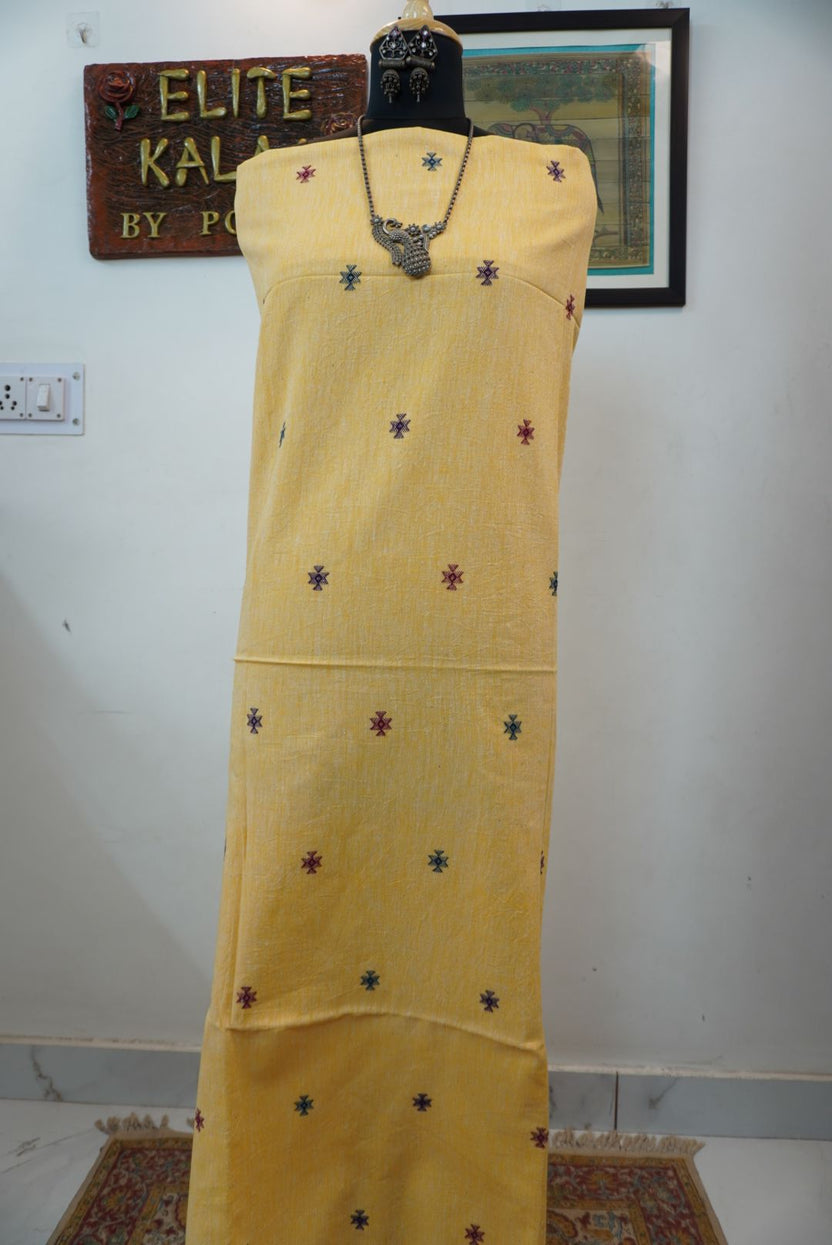 Yellow Bhujodi Kala cotton kurti with multicolor front chomuk placement pattern in blue, purple, red and green