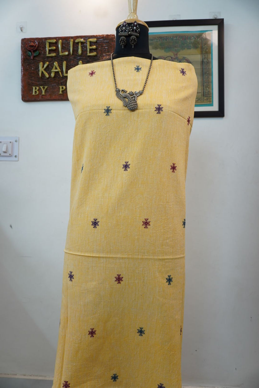 Yellow Bhujodi Kala cotton kurti with multicolor front chomuk placement pattern in blue, purple, red and green