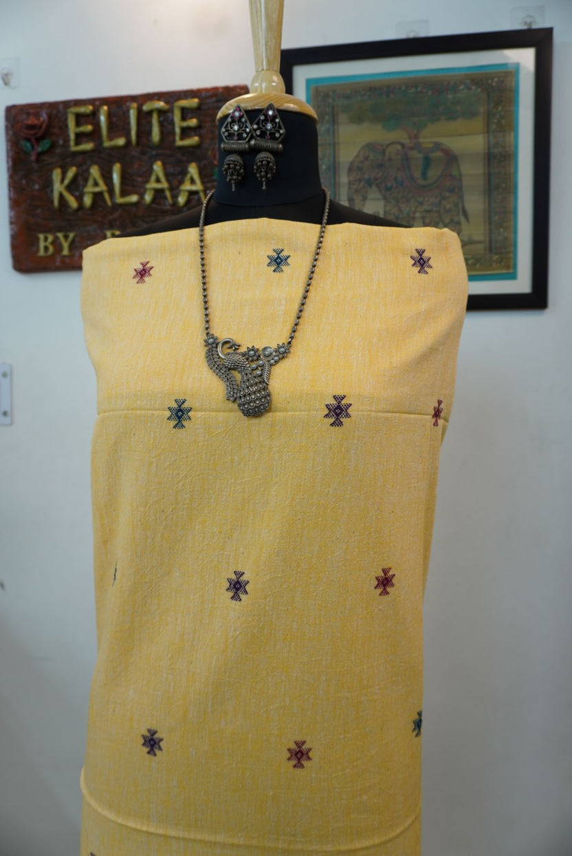 Yellow Bhujodi Kala cotton kurti with multicolor front chomuk placement pattern in blue, purple, red and green